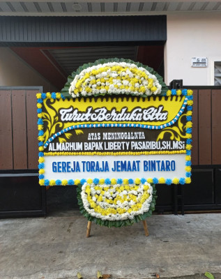 Papan Bunga Duka di Kelulome